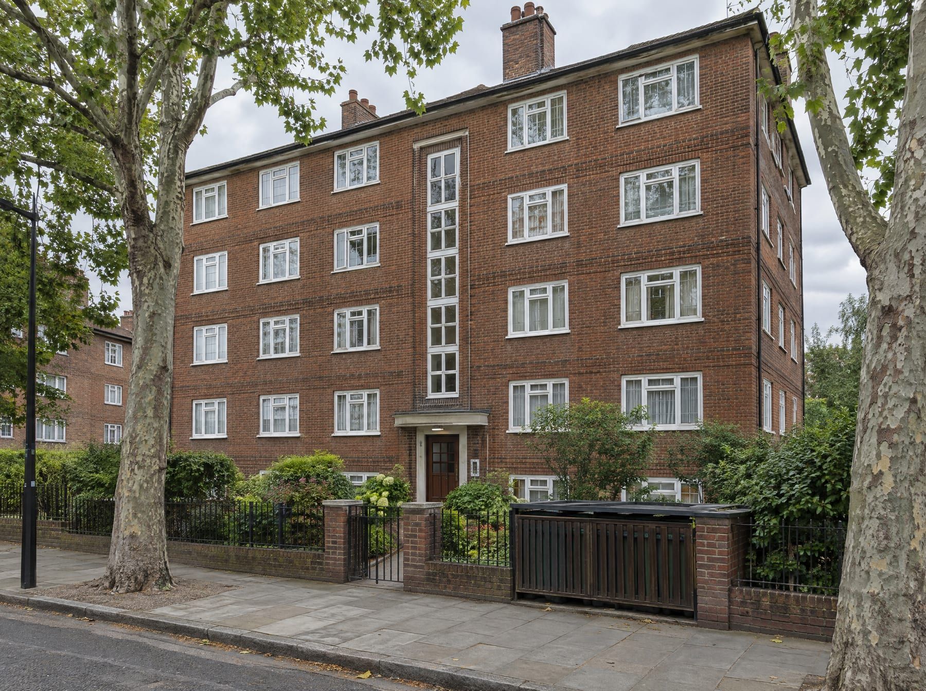 Purpose-built red-brick block of flats in north London